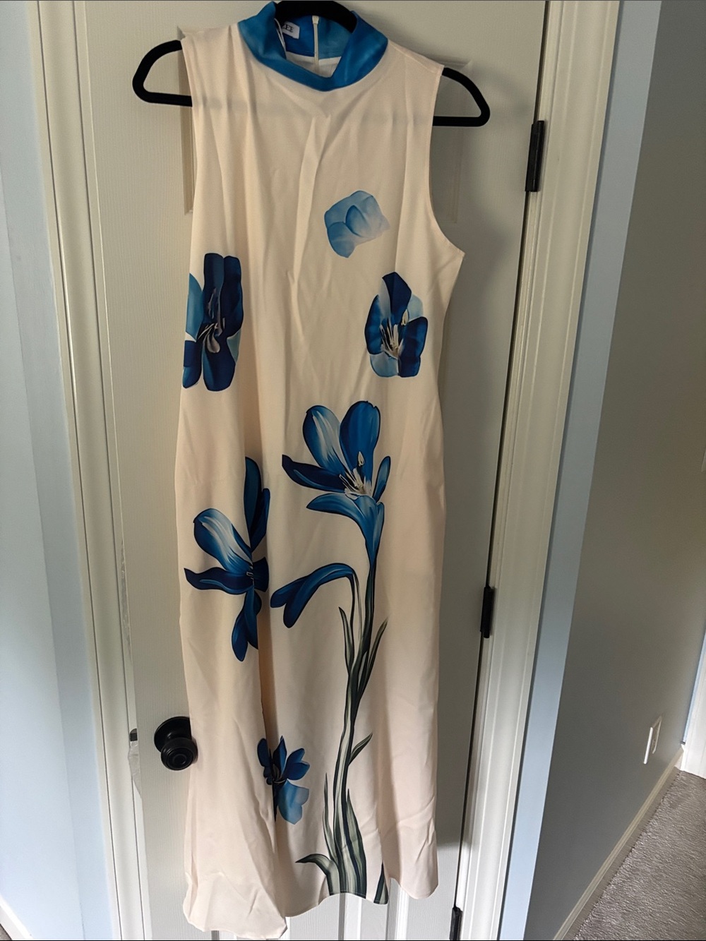 Sleeveless Cream Midi Dress with Blue Floral Print